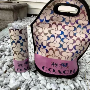 Coach Tan Tumbler Set.